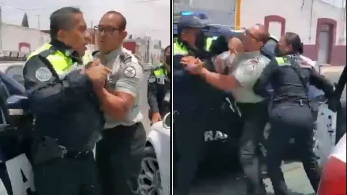 Captan a elemento de la GN peleando con policías de Puebla (Video)
