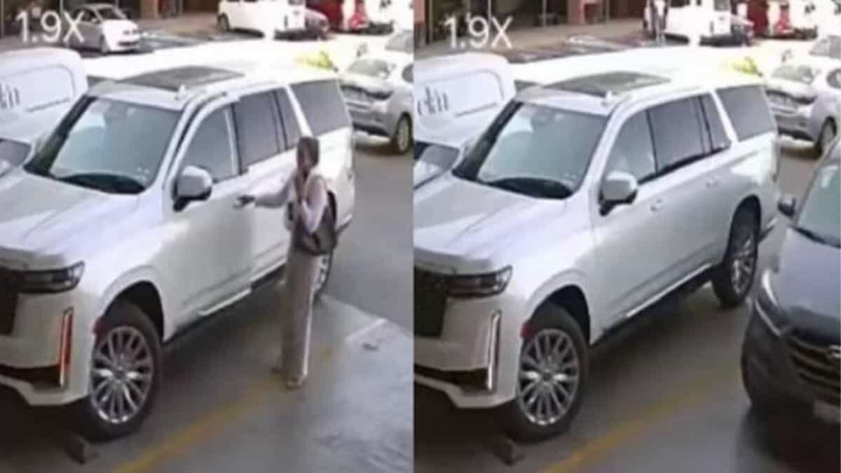 Choca mujer su camioneta de lujo contra auto; huye para no responder (Video)
