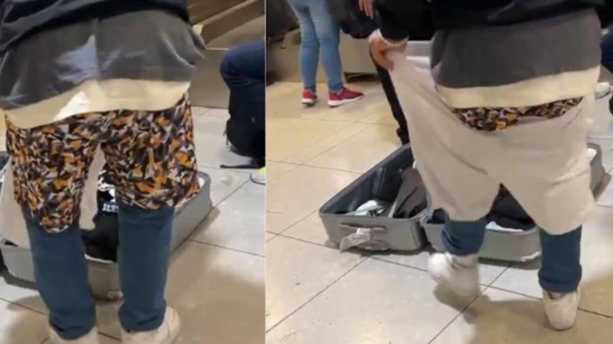 Evita turista pagar de más y se pone ropa de su equipaje (Video)